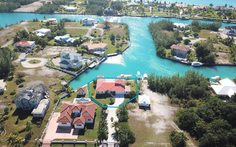 villa for sale with canal and ocean views grand bahamas